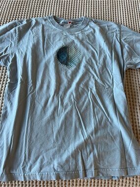 Light Blue Graphic Tee with Small Center Logo
